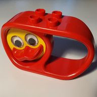 Деталь LEGO Duplo Rattle 2 x 6 x 3 with Handle and Yellow Duck Face, Красный